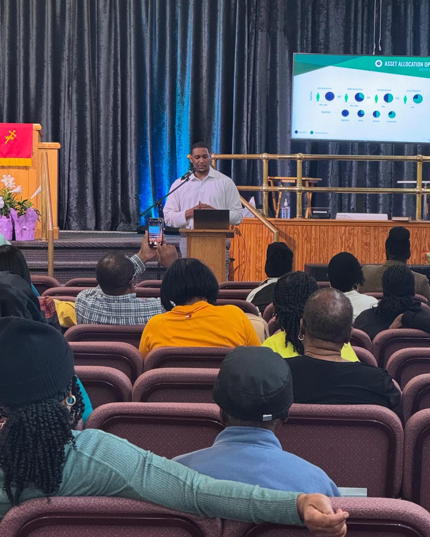 Jordan McGowen teaching a church financial workshop